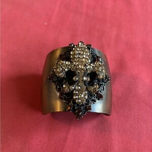 Woman designer Braclet bronze with beautiful stones. One size fits .Never worn.